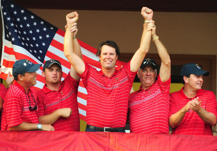 Paul Azinger celebrates with team members