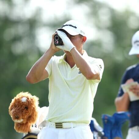 Players skeptical whether rangefinders will speed play